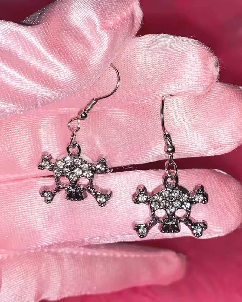 Boucle d'oreille tête de mort