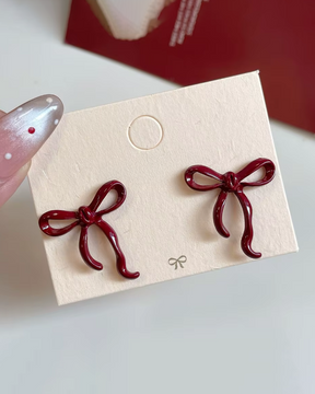 Boucle d'oreille en forme de noeud